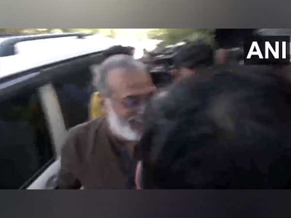 Founder and Editor-in-Chief of NewsClick Prabir Purkayastha at  Delhi Police Special Cell office. (Photo/ANI)