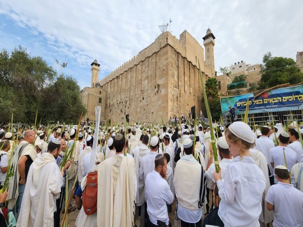 Jews celebrate the week-long holiday of Sukkot at the Tomb of the Patriarchs in Hebron. (Photo/TPS)