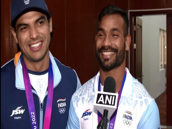 Neeraj Chopra (left) Kishore Jena (right) (Photo/ANI)