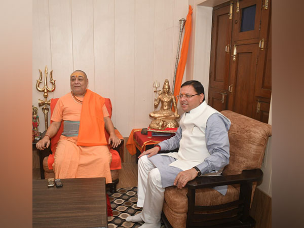 Uttarakhand Chief Minister Pushkar Singh Dhami pays courtesy visit to Shankaracharya Swami Rajarajeshwarashramin Haridwar (Photo/ANI)