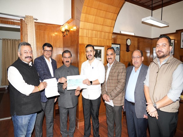 Himachal Pradesh Public Works Minister, Vikramaditya Singh presenting a cheque towards 'Aapda Rahat Kosh' (Photo/ANI)