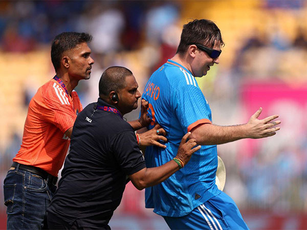 Jarvo being escorted from the stadium. (Photo- Twitter)