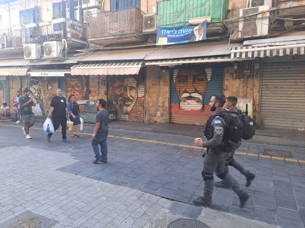 Mahane Yehudah outdoor Market in Jerusalem - the Shuk - was deserted Sunday as most restaurants and non-essential stores there did not open. Photos by Gil Tanenbaum/TPS