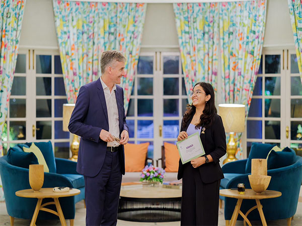 British High Commissioner Alex Ellis with Shreya Dharmarajan (Photo/ANI)