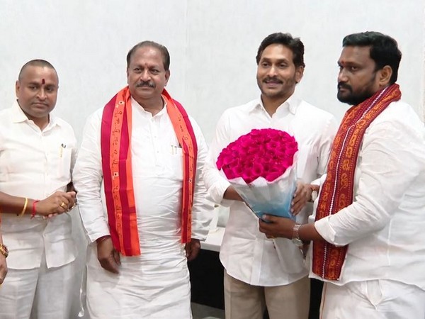 Chief Minister YS Jagan Mohan Reddy while receiving the invitation. (Photo/ANI)