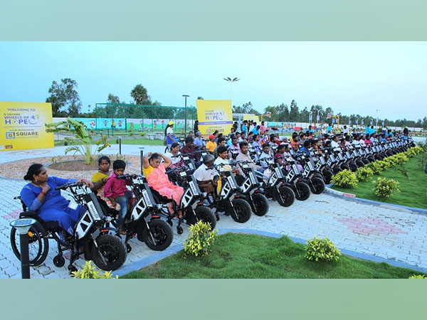 G Square Wheels of Hope Initiative recipients with their motorized wheelchairs