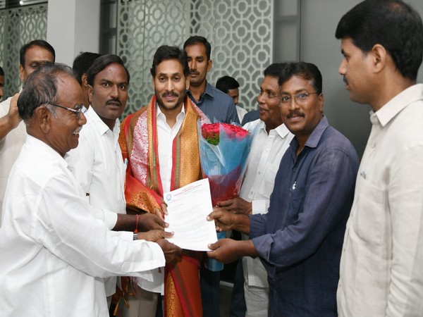 Andhra Pradesh CM Jagan Mohan Reddy (Centre) (Photo/ANI)