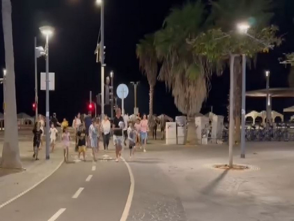 Israelis run out of their residences as siren blared in Tel Aviv (Photo/ANI)