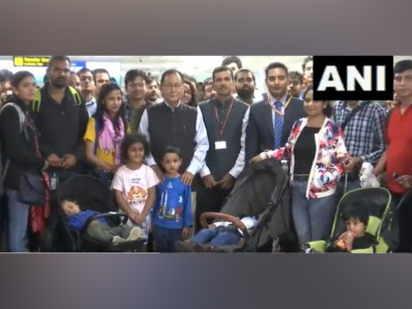 MoS MEA Rajkumar Ranjan Singh receives the Indian nationals evacuated from Israel. (Photo/ANI)