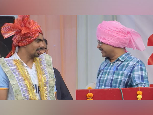 Pawan Sehrawat and Arvind Kejriwal (Photo: ANI)