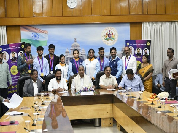 Chief Minister Siddaramaiah with Asian Games medal winners from the State. (Photo/ANI)