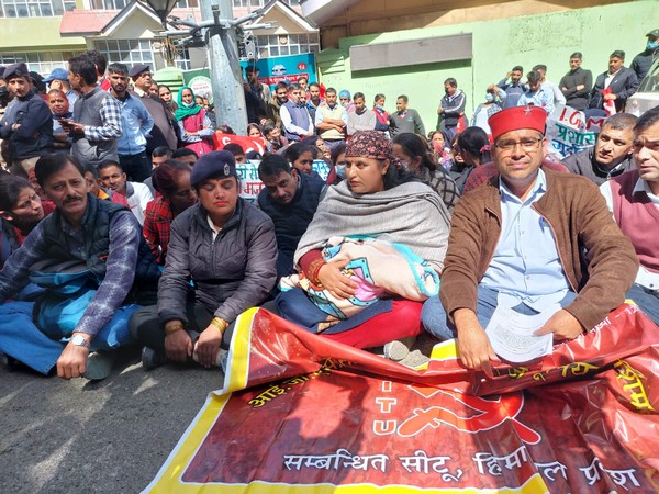 Fired staff hold a silent protest. (Photo/ANI)