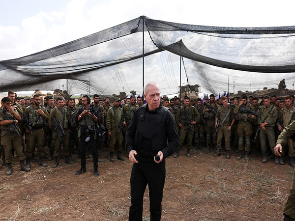 Israel's Defence Minister Yoav Gallant meets IDF soldiers near Israel's border with the Gaza strip (Photo Credit: Reuters)