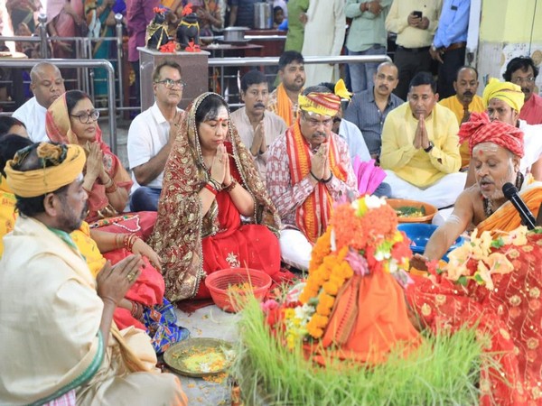 Union Minister Dharmendra Pradhan offer prayers to goddess Durga in Angul district. (Photo/ANI)