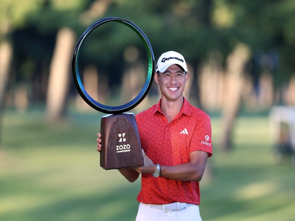 Collin Morikawa lifting Zozo Championship Trophy (Image: PGA)