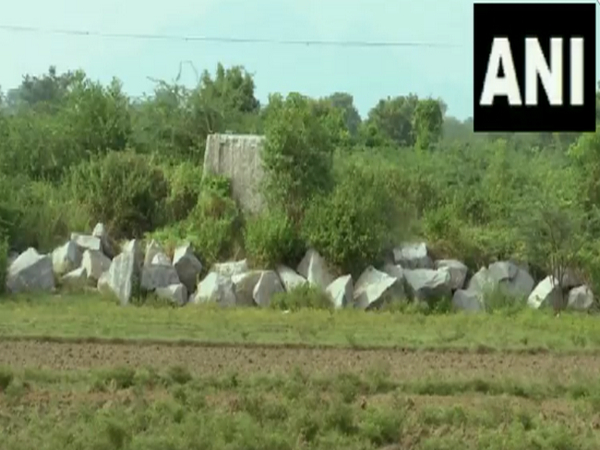 Visuals of granite stones placed near the farming land and ponds (Photo/ANI)