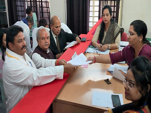 Union Minister Narendra Singh Tomar filing nomination paper (Photo/ANI)
