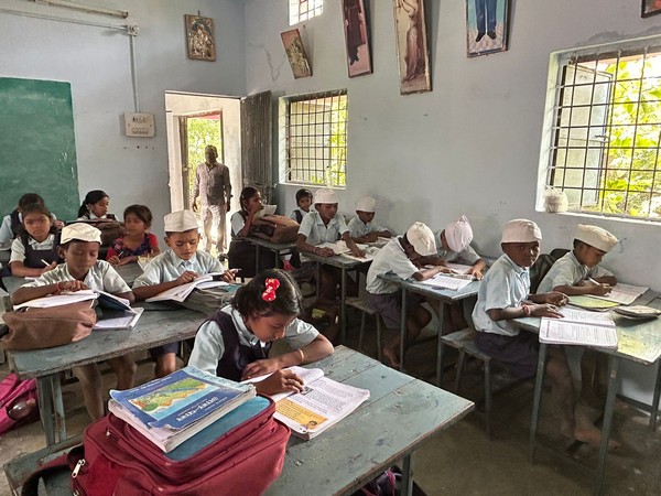Students of this school in MP's Chhindwara wear Gandhi caps daily. (Photo/ANI)