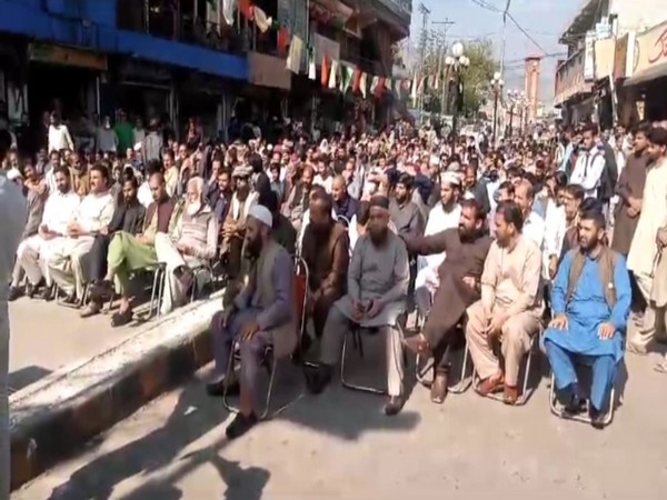 A large group of people protesting against hefty electricity bills in PoK's Muzaffarabad (Photo/ANI)