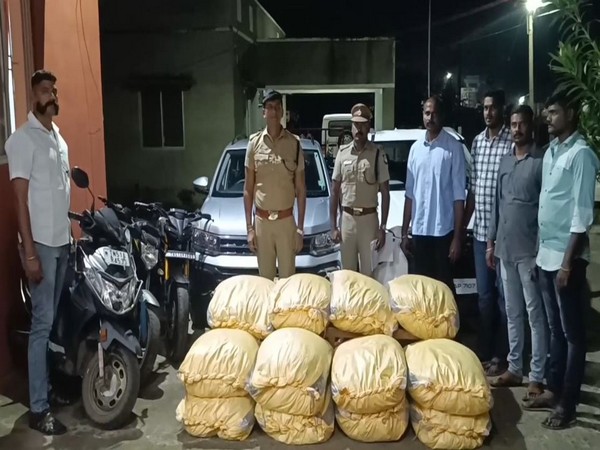Tamil Nadu police officials with seized ganja. (Photo/ANI)