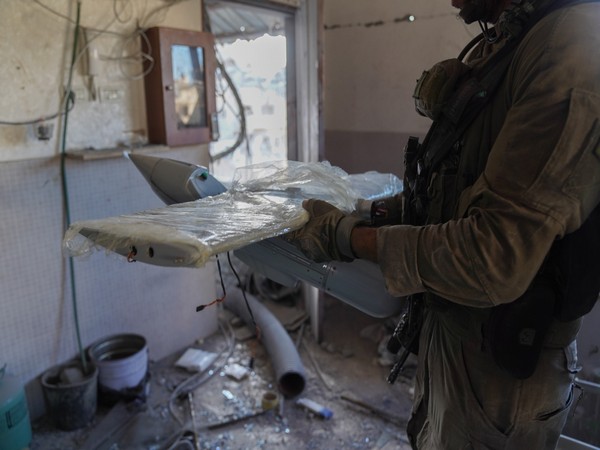 An Israeli soldier holds parts of an aerial drone (Photo/TPS)