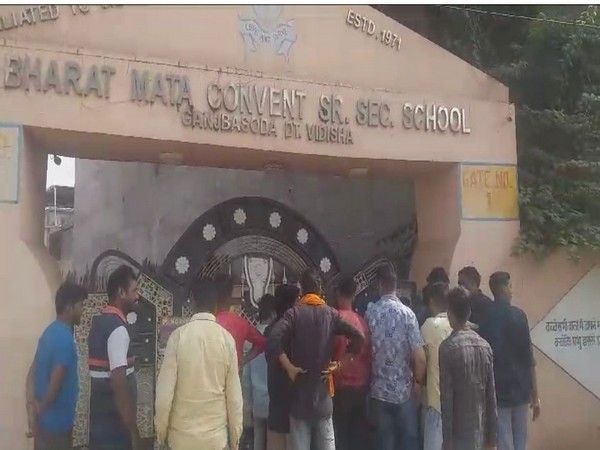 People gather outside Bharat Mata Convent School Vidisha (Photo/ANI)