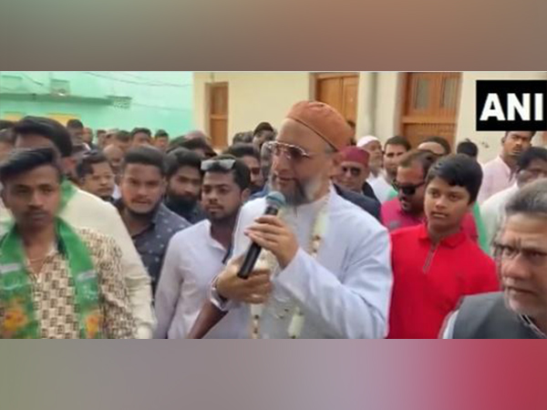 AIMIM president Asaduddin Owaisi during door-to-door election campaign on Saturday. (Photo/ANI)