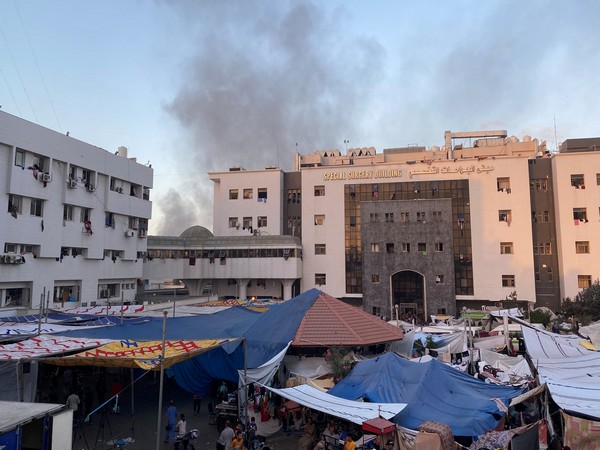 Smoke rises as displaced Palestinians take shelter at Al Shifa hospital, amid the ongoing conflict between Hamas and Israel, in Gaza City (Photo credit/Reuters)