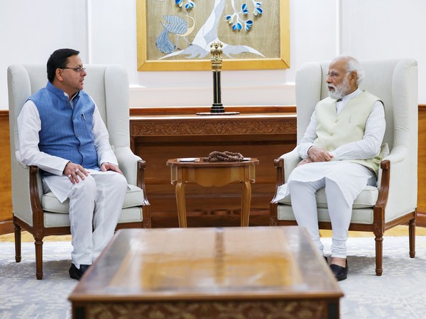 Pushkar Singh Dhami with PM Narendra Modi (File Photo/ANI)