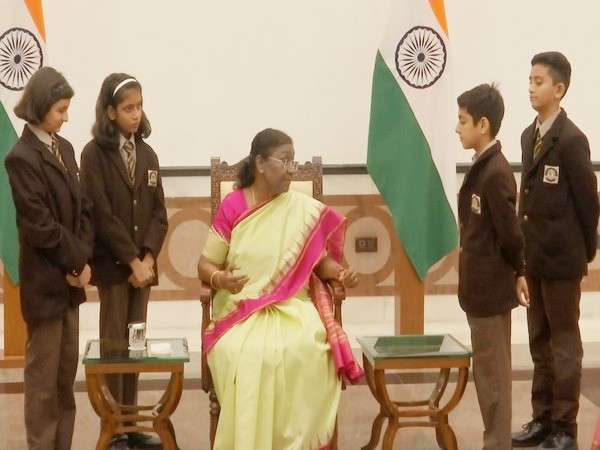 President Droupadi Murmu while interacting with different school children on Children's Day. (Photo/ANI)
