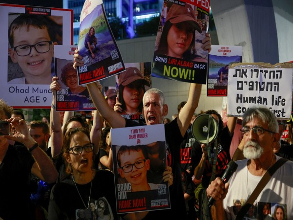 Protesters call for the immediate release of hostages, in Tel Aviv (Photo Credit: Reuters)
