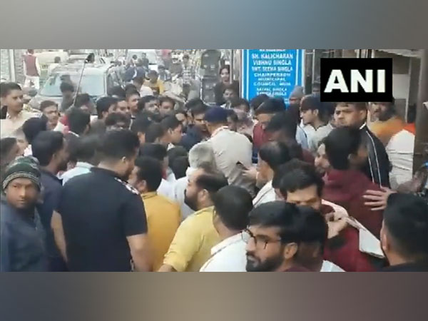 A group of locals stage protest in Nuh on Friday. (Photo/ANI)