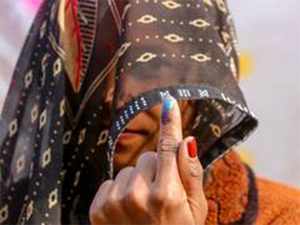 A female voter after casting her ballot. (Photo/ANI)