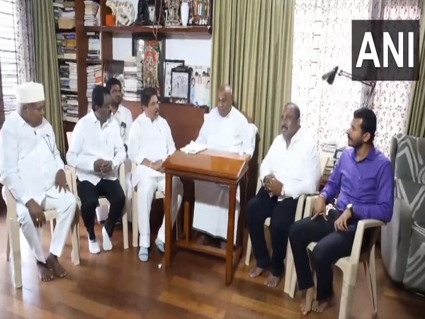 Newly appointed LoP in Karnataka Assembly R Ashoka meets former PM HD Deve Gowda (Photo/ANI)