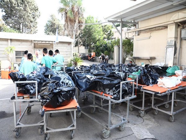 Trucks filled with dead bodies from Israeli communities near the Gaza border (Photo/TPS)