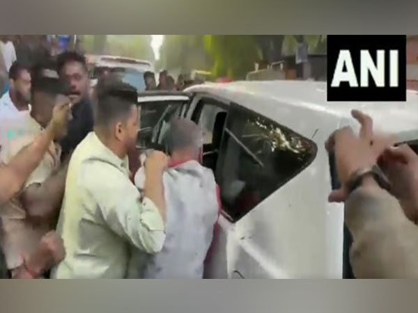 Sharad Pawar supporters blacken writer Namdev Jadhav’s face in Pune (Photo/ANI)