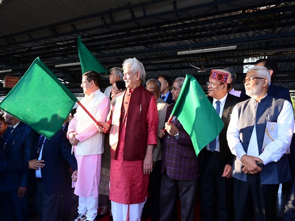 Jammu and Kashmir Lieutenant Governor Manoj Sinha flagging off train (Photo/X@OfficeOfLGJandK)