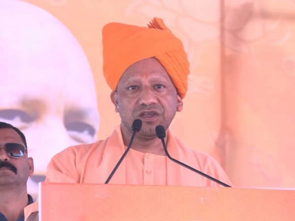 Uttar Pradesh Chief Minister Yogi Adityanath addressing a rally in Chittorgarh. (Photo/ANI)