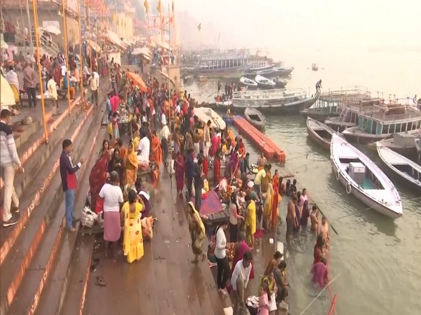 Devotees take holy dip in river Ganga in Varanasi (Photo/ANI)