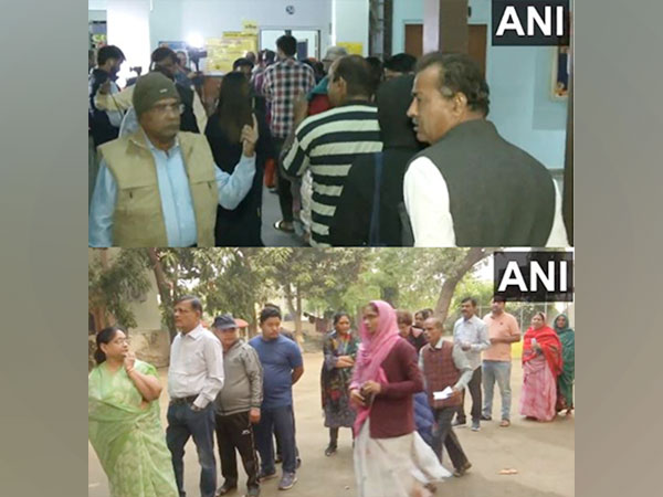 Voters queue up to cast their votes in various constituencies of Rajasthan. (Photo/ANI)