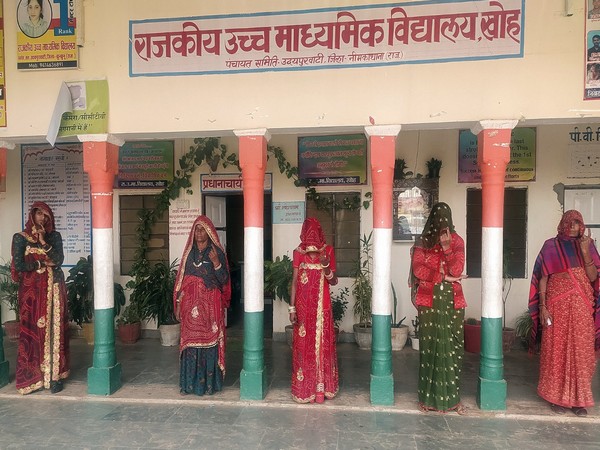 Female voters showing their ink-marked fingers after casting a vote in Neem Ka Thana (Photo/ANI)