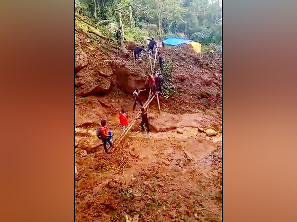 Tamil Nadu Disaster Rescue team involved in rescue operation 20 km from Coonoor. (Photo/ANI)