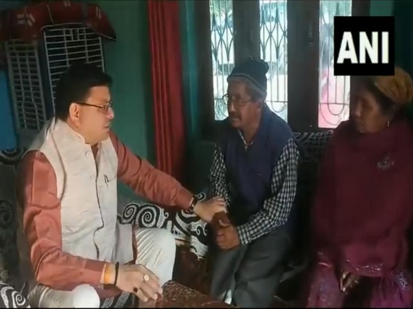 Uttarakhand CM Dhami visits house of trapped worker in Tanakpur. (Photo/ANI)