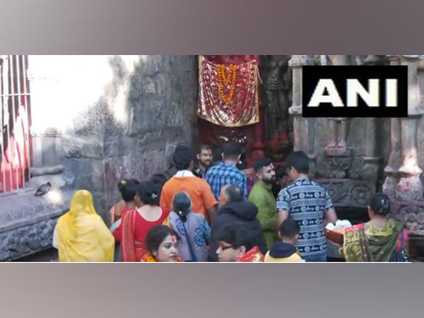 Devotees offer prayers at Kamakhya Temple on the occasion of Kartik Purnima. (Photo/ANI)