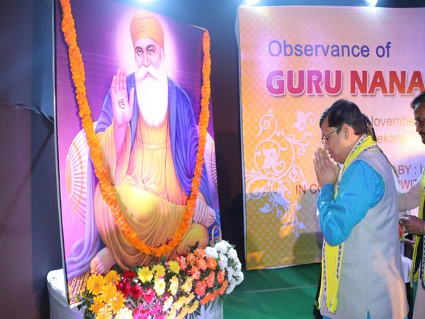 Tripura Social Welfare minister Tinku Roy pays tribute to Guru Nanak. (Photo/ANI)