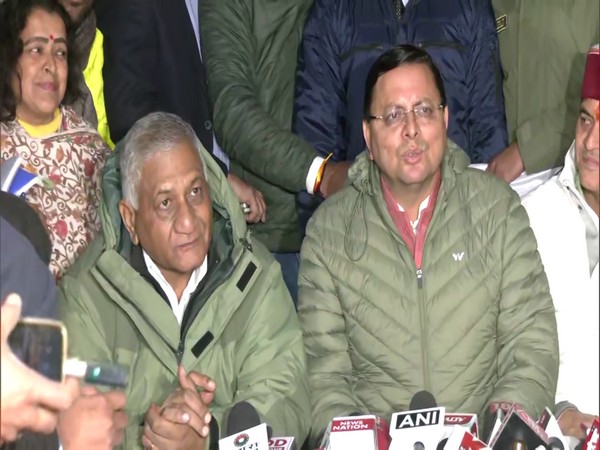 CM Dhami with VK Singh (Photo/ANI)