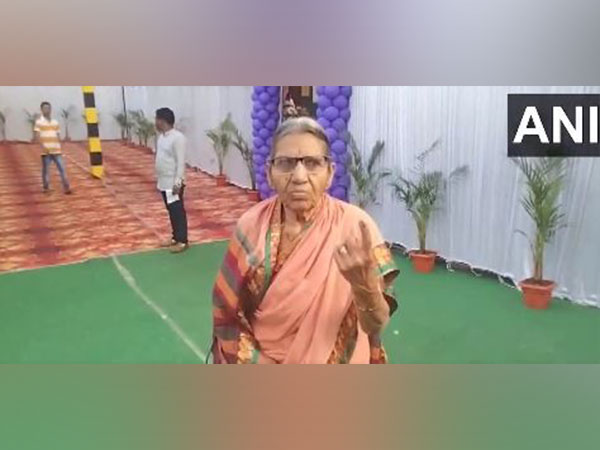 An elderly woman showing her ink-marked finger in Nizamabad (Photo/ANI)