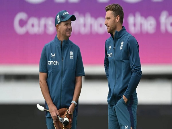 Matthew Mott and Jos Buttler (Photo: ICC)
