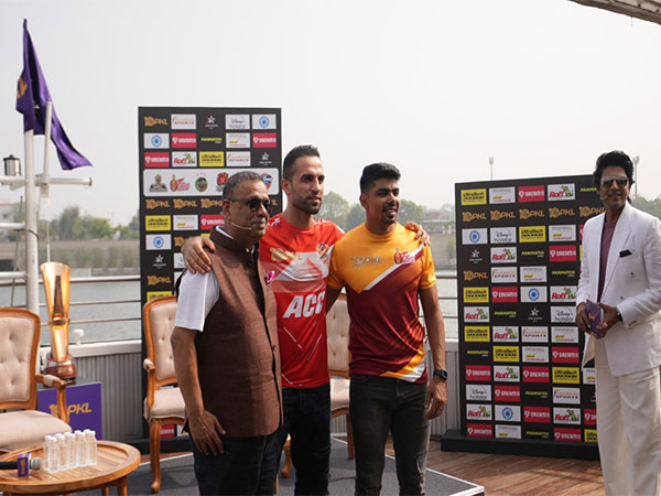 Gujarat Giants captain Fazel Atrachali with Telugu Titans captain Pawan Sehrawat ahead of season 10 (Image: PKL)
