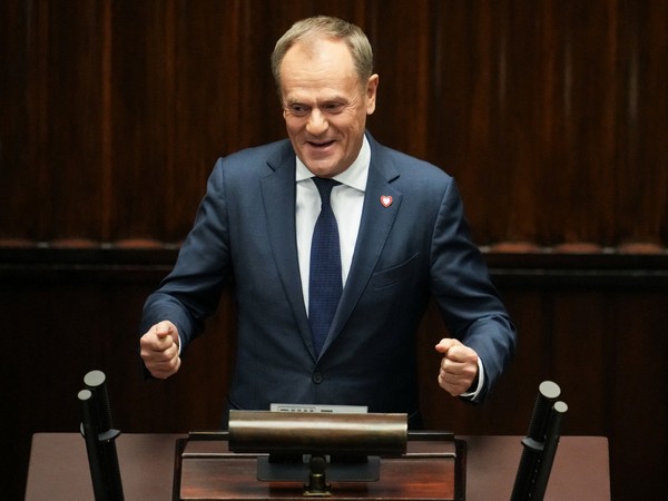 Leader of the Civic Coalition (KO) Donald Tusk speaks after the Parliament voted in favor of him becoming Poland's PM (Image Credit: Reuters)